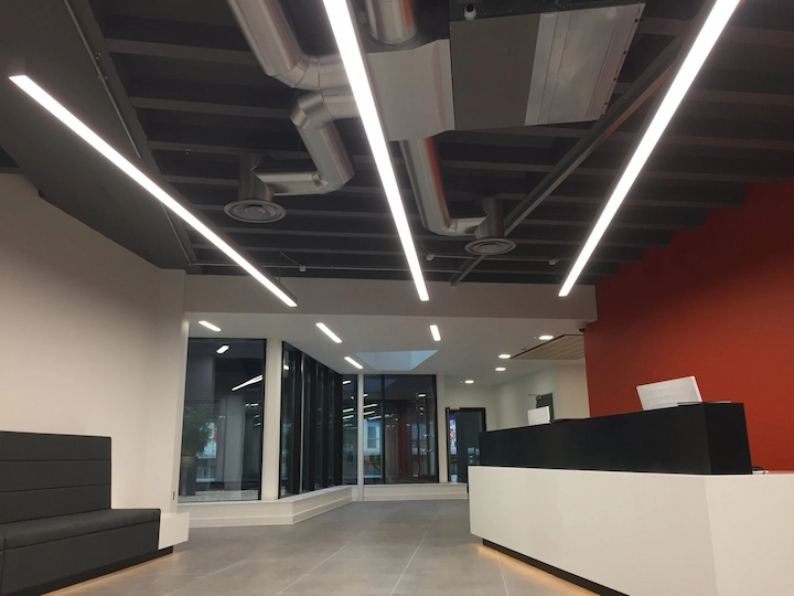 Modular linear LED luminaires installed in a premium London Cat A office