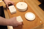 DALI-2 lighting control devices on a workbench