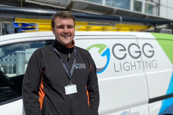 EGG Electrical engineer standing in front of EGG Lighting van